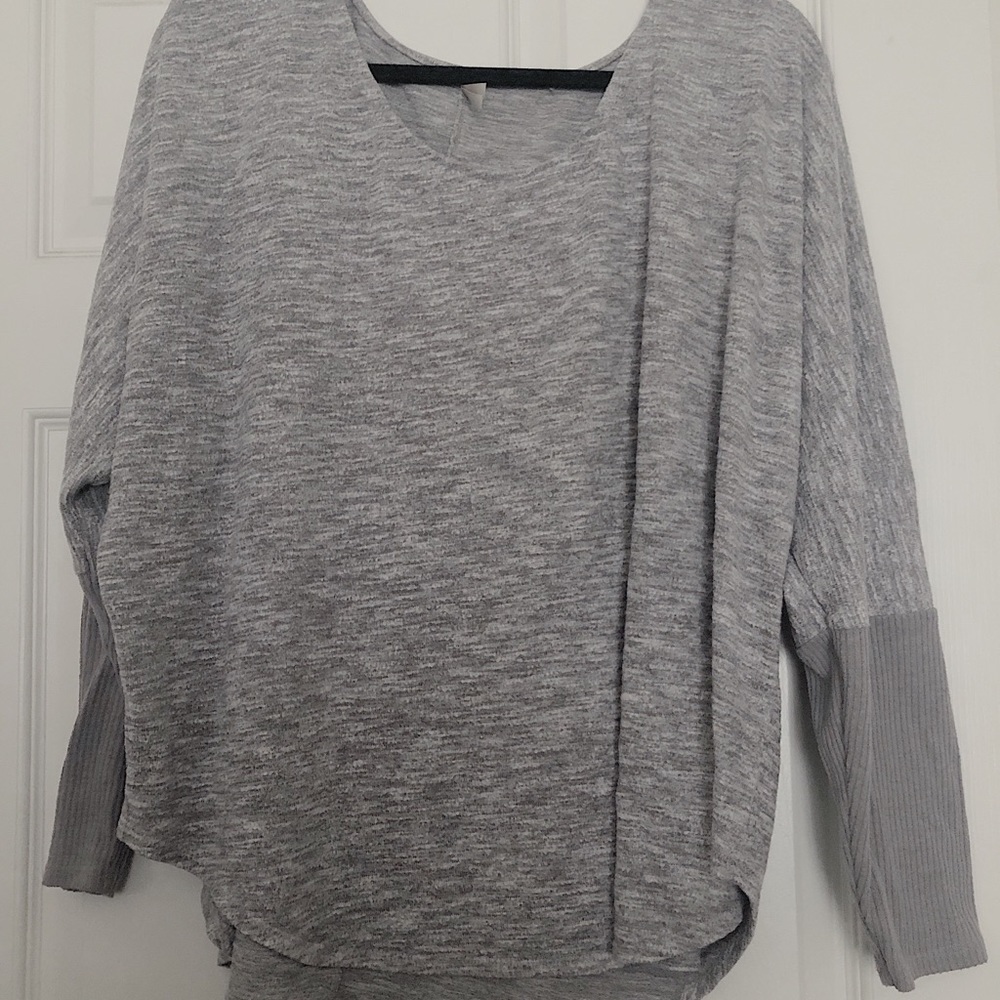 grey sweater.